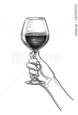 Hand holding a glass of wine. 38704552