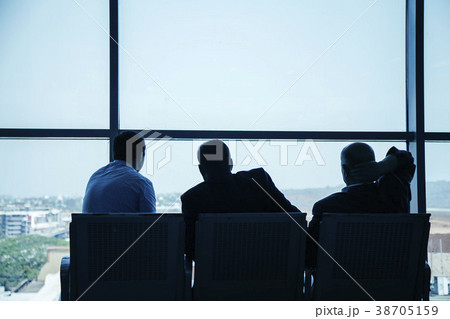 businessmen are sitting at the airport businessmen are sitting at the airport 38705159