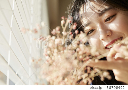 花 女子大生 笑顔 38706492