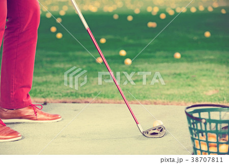 Golf player using golf club Golf player using golf club 38707811