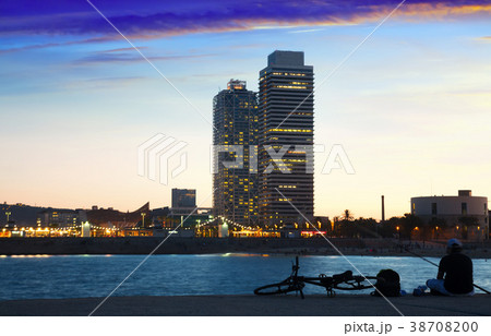Barceloneta beach with skyscrapers in sunset 38708200