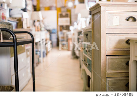 Image of modern furniture shop with wooden chest of drawers 38708489