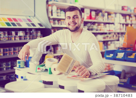 Male customer purchasing tools for house improvements Male customer purchasing tools for house improvements 38710483