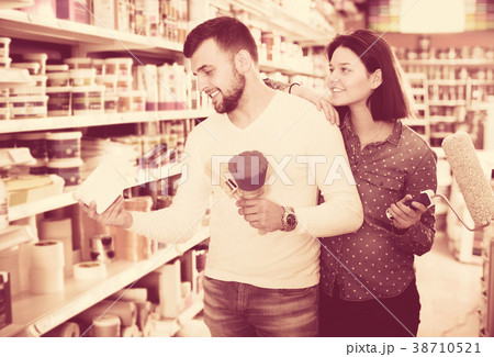 Couple choosing house decoration materials Couple choosing house decoration materials 38710521