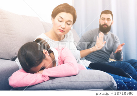 Father lecturing wife and daughter Father lecturing wife and daughter 38710990
