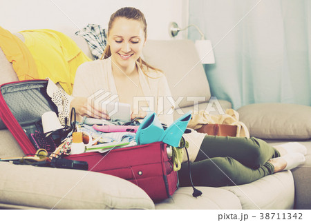 Woman getting ready for holidays 38711342