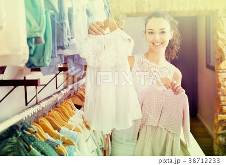 Woman shopping baby dress Woman shopping baby dress 38712233