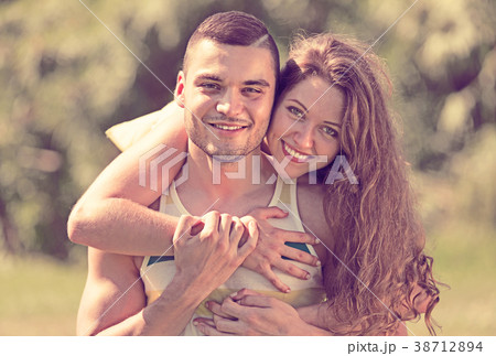 Girl and boyfriend in summer park Girl and boyfriend in summer park 38712894