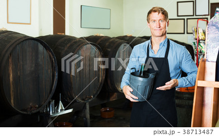 Male seller in winnery 38713487