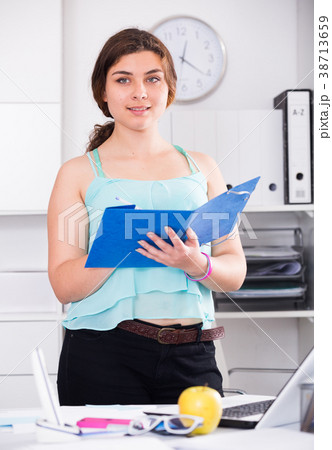 Manager is signing agreement papers of financial nature 38713659