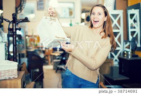 Satisfied woman with stylish basket Satisfied woman with stylish basket 38714091
