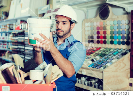 foreman closely reading instruction on paint foreman closely reading instruction on paint 38714525