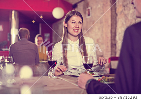 colleague on friendly meeting over dinner 38715293