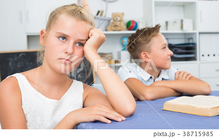 Girl is offended by her friend after their play Girl is offended by her friend after their play 38715985
