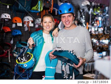 Athletes chooses climbing equipment 38718064