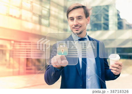 Business man pressing virtual buttons 38718326