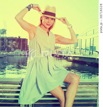 Cheerful woman in the hat 38718328