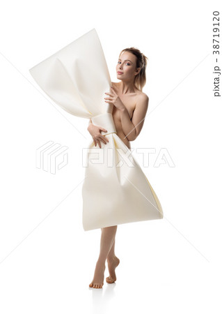 Nude pretty girl holding a huge bow in her hands Nude pretty girl holding a huge bow in her hands 38719120