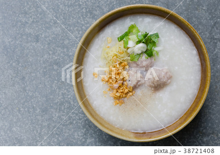 Asian Rice Porridge with Meatballs for Breakfast. 38721408