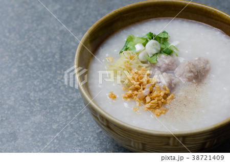 Asian Rice Porridge with Meatballs for Breakfast. 38721409