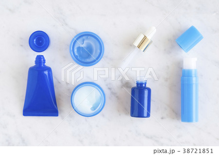 Flatlay skincare cosmetic products on marble Flatlay skincare cosmetic products on marble 38721851