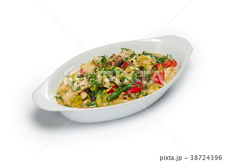 Fillet with vegetables baked in oven 38724396