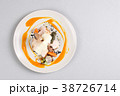 chicken breast with vegetables on a white plate. 38726714