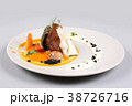 chicken breast with vegetables on a white plate. 38726716