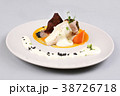 chicken breast with vegetables on a white plate. 38726718
