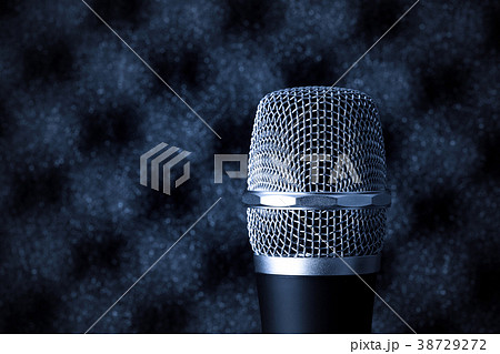 microphone closeup on foam acoustic background 38729272