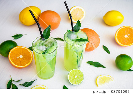 Refreshing drink with cucumber, limes and orange. 38731092