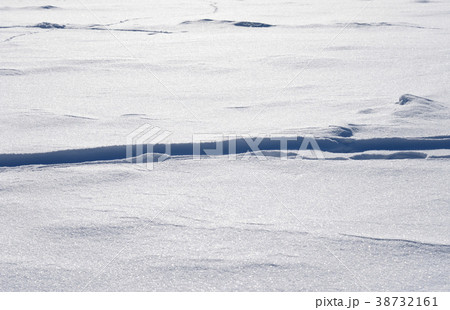 Snow background with traces. 38732161