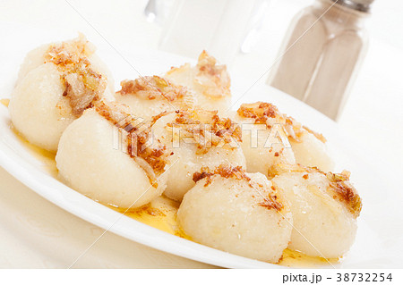 Meat stuffed dumplings with fried onion Meat stuffed dumplings with fried onion 38732254