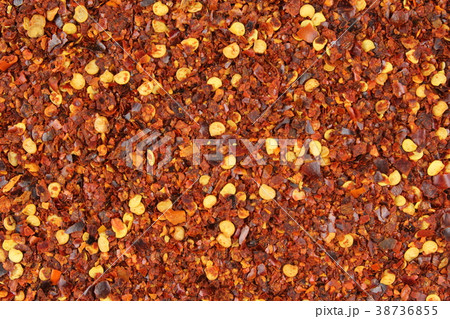 crushed red pepper flakes closeup food background 38736855