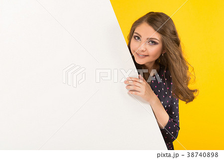 Attractive woman with blank banner Attractive woman with blank banner 38740898