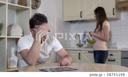 Nervous young woman quarreling with man, annoyed 38741198