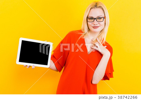 Blonde woman with tablet pc 38742266