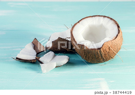 Coconut on wooden table on bright blurred Coconut on wooden table on bright blurred 38744419