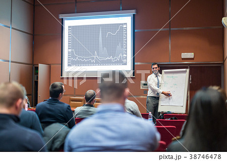 Skiled Public Speaker Giving a Talk at Business 38746478