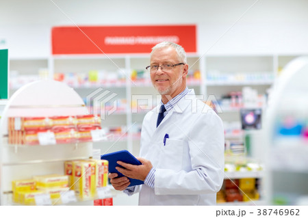 senior with tablet pc at pharmacy senior with tablet pc at pharmacy 38746962