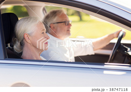 happy senior couple driving in car happy senior couple driving in car 38747118
