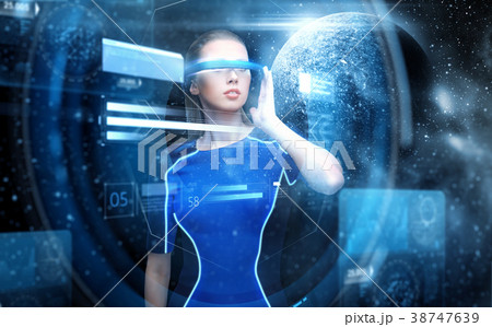 woman in virtual reality glasses over space woman in virtual reality glasses over space 38747639