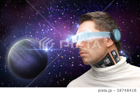 male robot in 3d glasses and sensors over space male robot in 3d glasses and sensors over space 38748416
