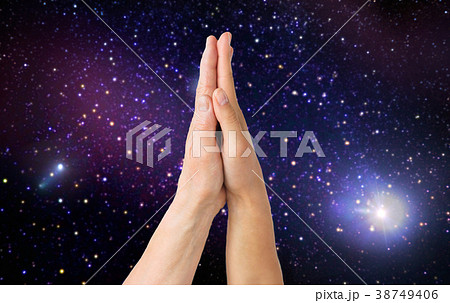 close up of senior and young woman touching hands close up of senior and young woman touching hands 38749406