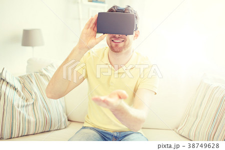 young man in virtual reality headset or 3d glasses young man in virtual reality headset or 3d glasses 38749628