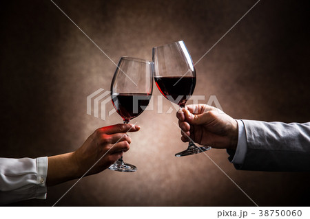 toasting with wine glasses toasting with wine glasses 38750060