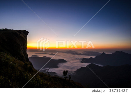 Sunrise scene with the peak of mountain  38751427