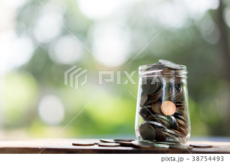Saving money concept,money coins in glass jar 38754493
