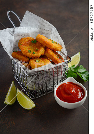 Crispy Fried Chicken Nuggets with Tomato Sauce. 38757567