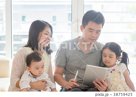 Asian people scanning QR code Asian people scanning QR code 38759425